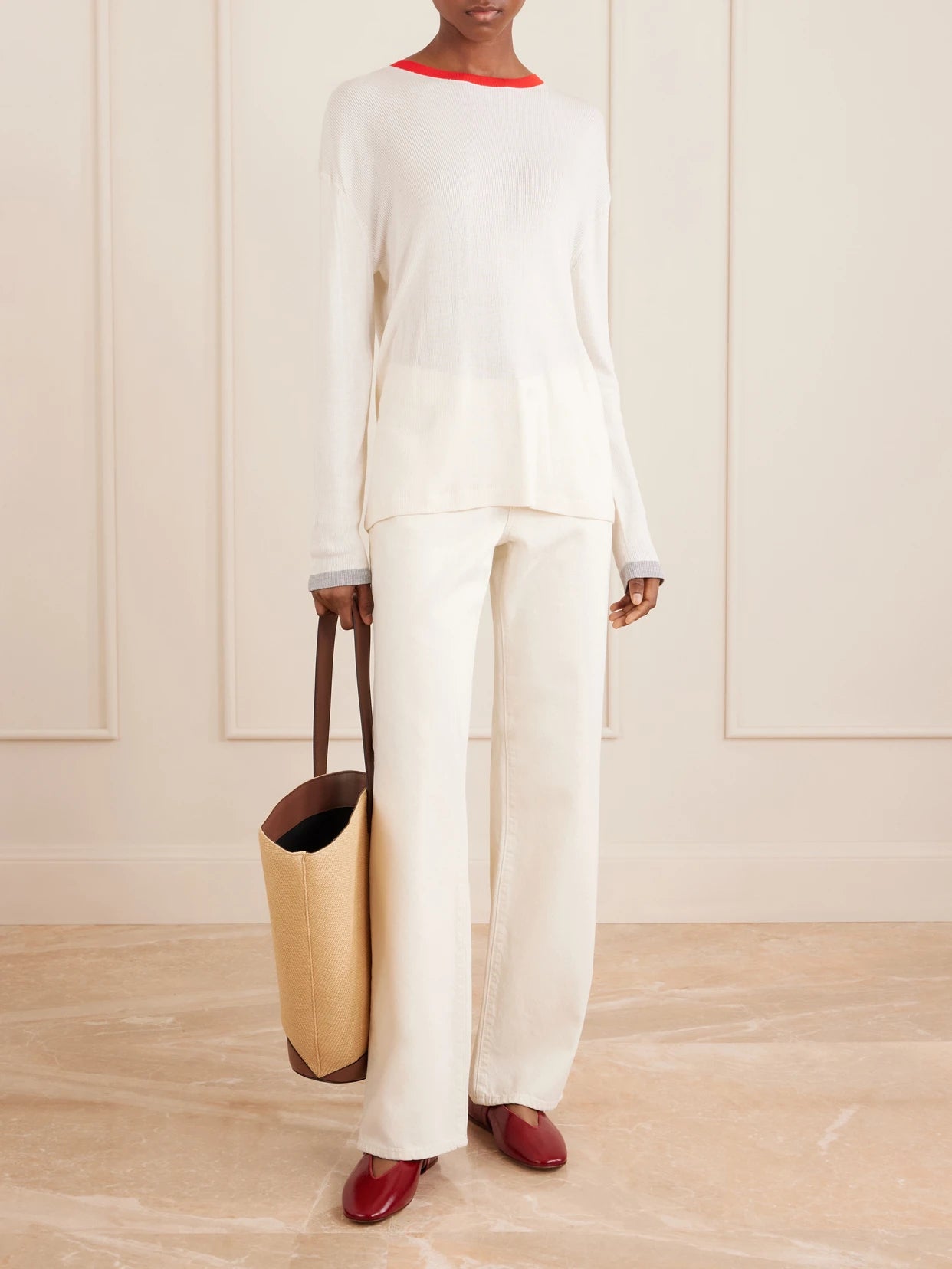Image of a model wearing Tops. Product name - Ribbed Jersey T-shirt in White colour by brand - TWP