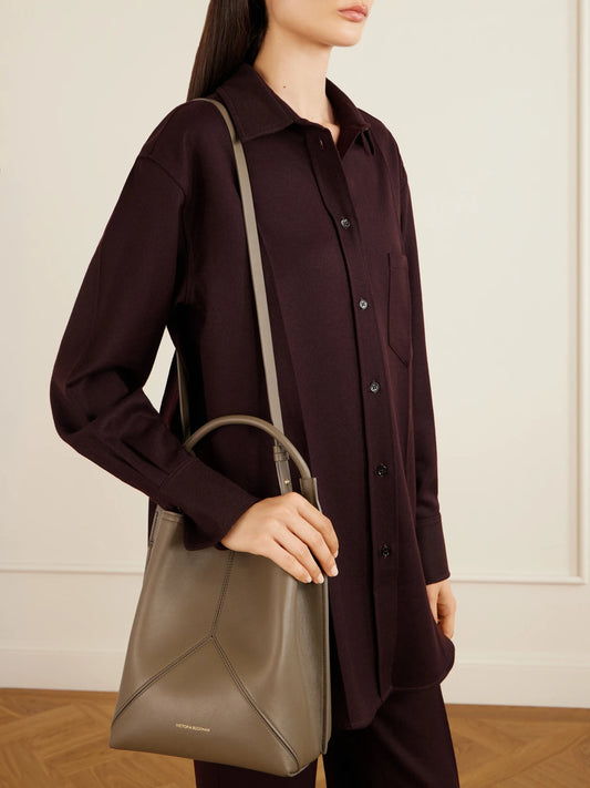 Image of Bags. Product name - The Victoria Bucket Leather Shoulder Bag in Army green colour by brand - Victoria Beckham