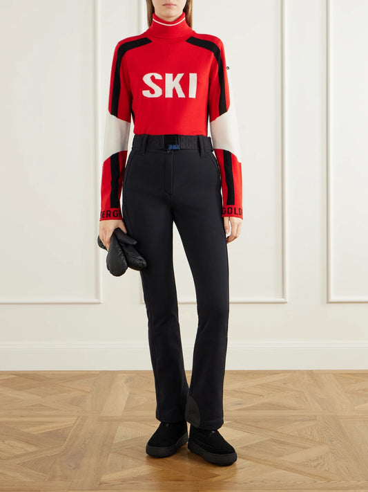Image of a model wearing Outerwear. Product name - Sport Merino Wool Sweater in Red colour by brand - Goldbergh