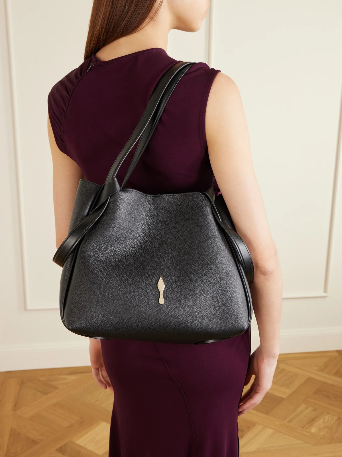 Image of Bags. Product name - Bettina Small Embellished Leather Tote in Black colour by brand - Christian Louboutin