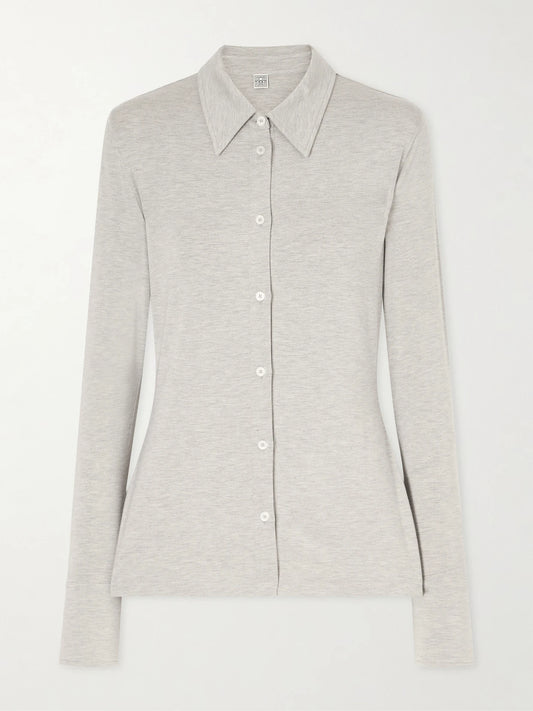 Image of a model wearing Tops. Product name - Jersey Shirt in Light gray colour by brand - TOTEME