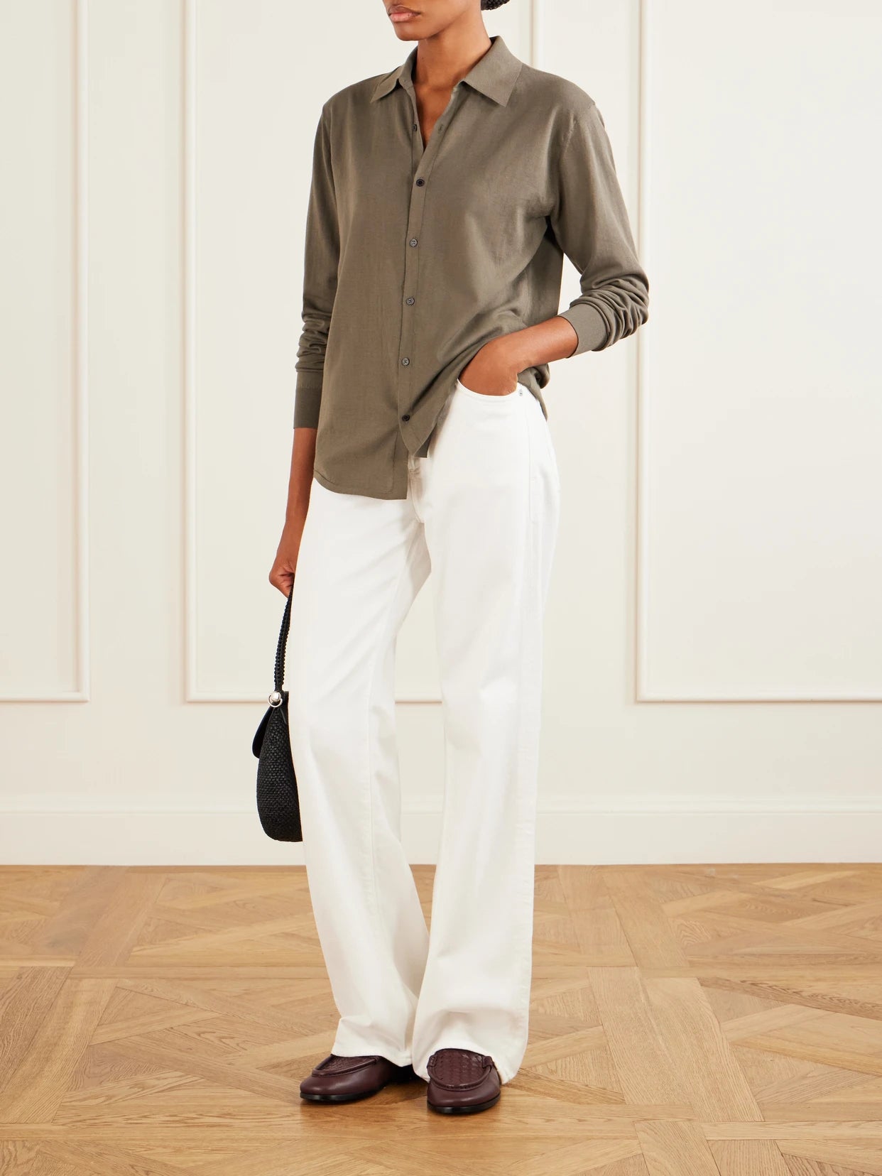 Image of a model wearing Tops. Product name - Giza Fine Knit Cotton Shirt in Army green colour by brand - Auralee