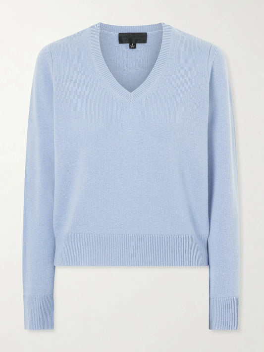 Image of a model wearing Outerwear. Product name - Camelia Knitted Cashmere Sweater in Light blue colour by brand - Nili Lotan