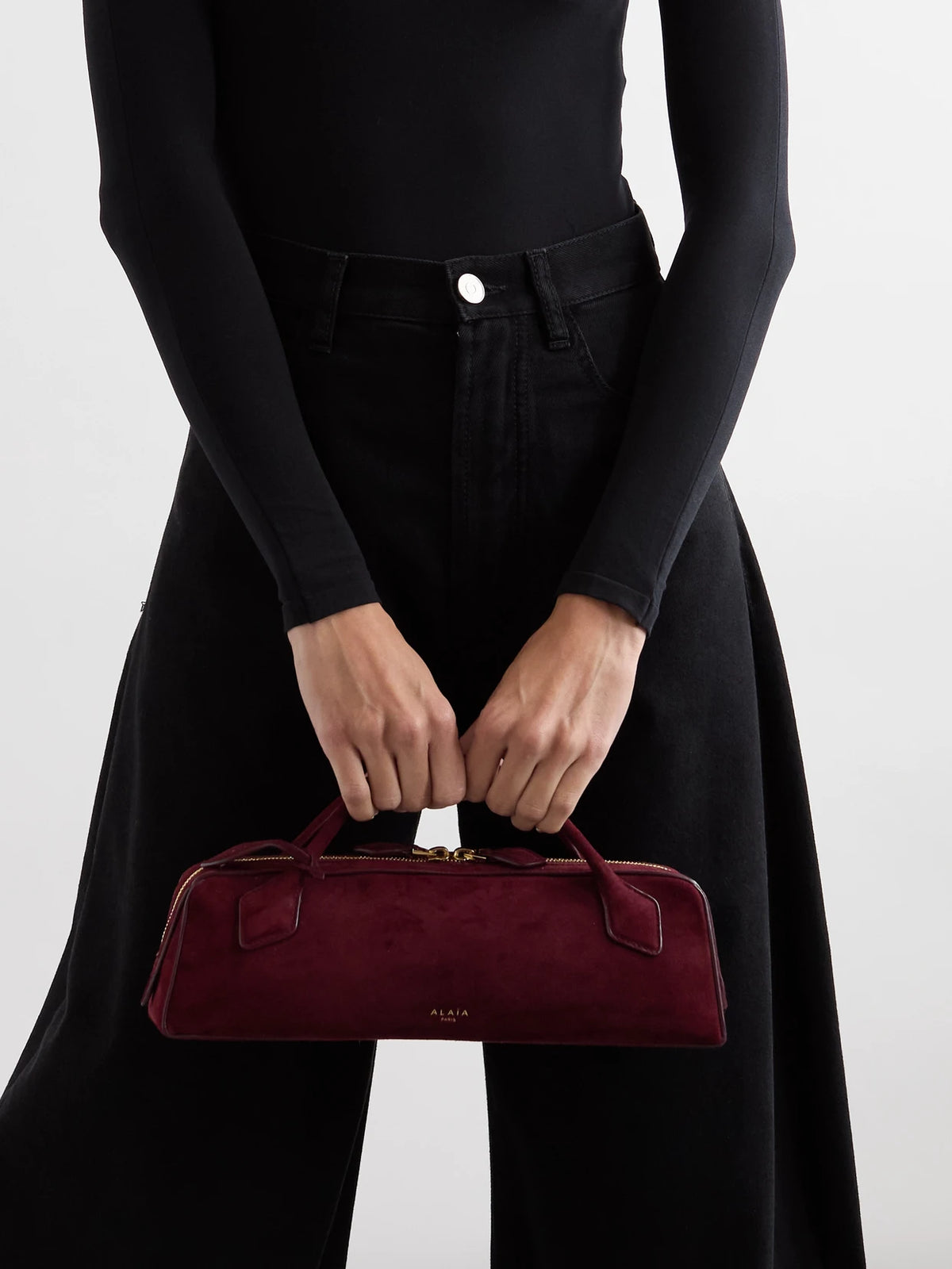 Image of Bags. Product name - Le Teckel Leather-trimmed Suede Clutch in Burgundy colour by brand - Alaïa
