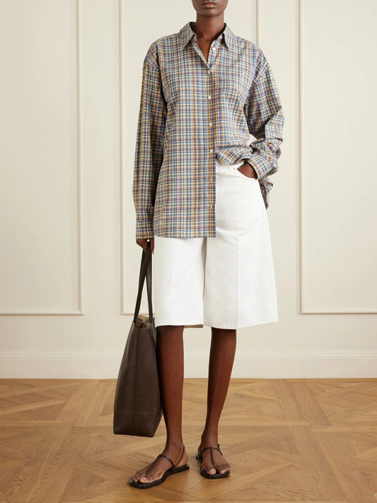 Image of a model wearing Tops. Product name - Checked Cotton Shirt in Blue colour by brand - TOTEME