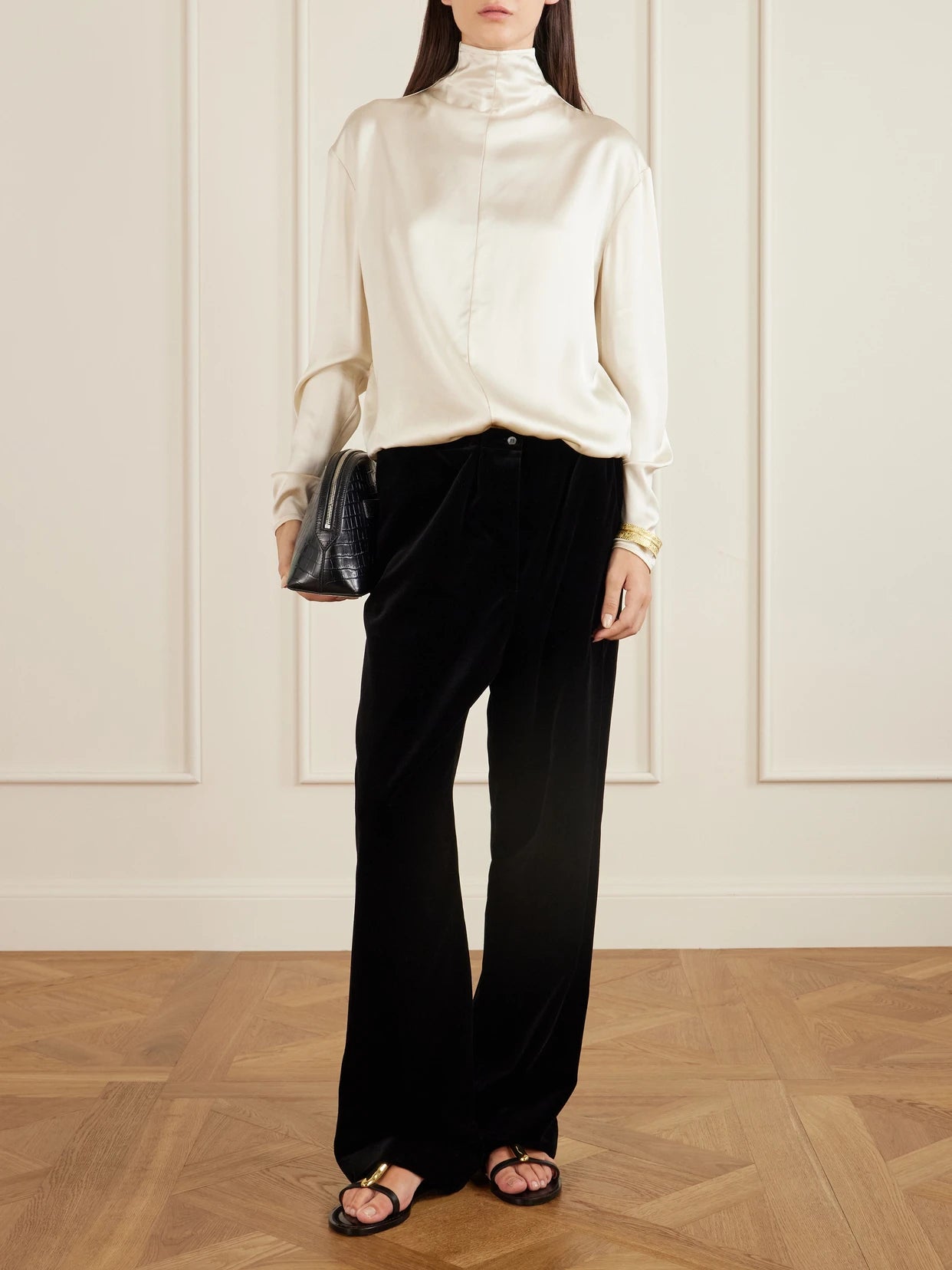 Image of a model wearing Pants. Product name - Cotton-velvet Pants in Black colour by brand - Colleen Allen