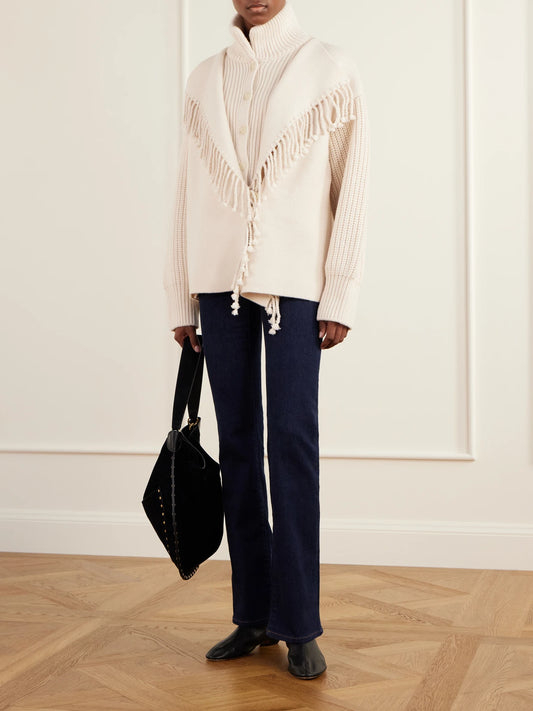 Image of a model wearing Outerwear. Product name - Fringed Wool Cardigan in Cream colour by brand - FRAME