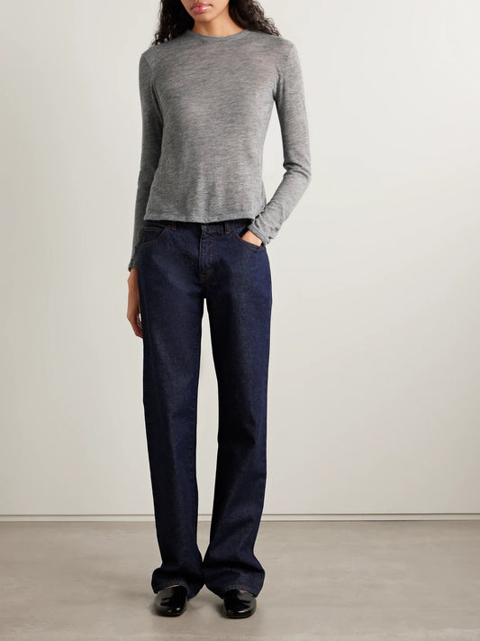 Image of a model wearing Tops. Product name - Iverness Cashmere Top in Gray colour by brand - The Row