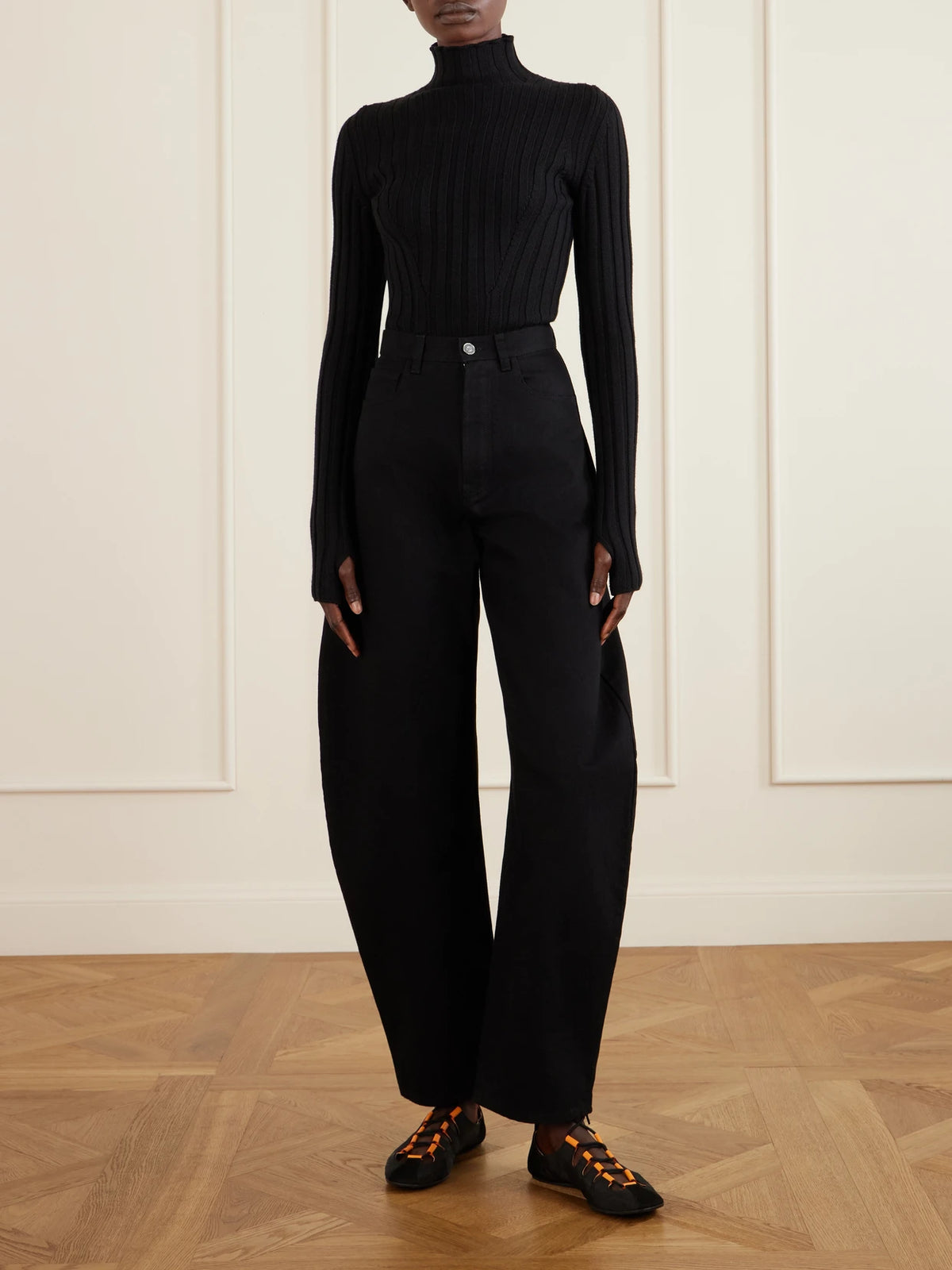 Image of Flats. Product name - Suede-trimmed Shell Ballet Flats in Black colour by brand - Alaïa