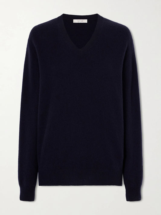 Image of a model wearing Outerwear. Product name - Numi Cashmere Sweater in Navy colour by brand - The Row