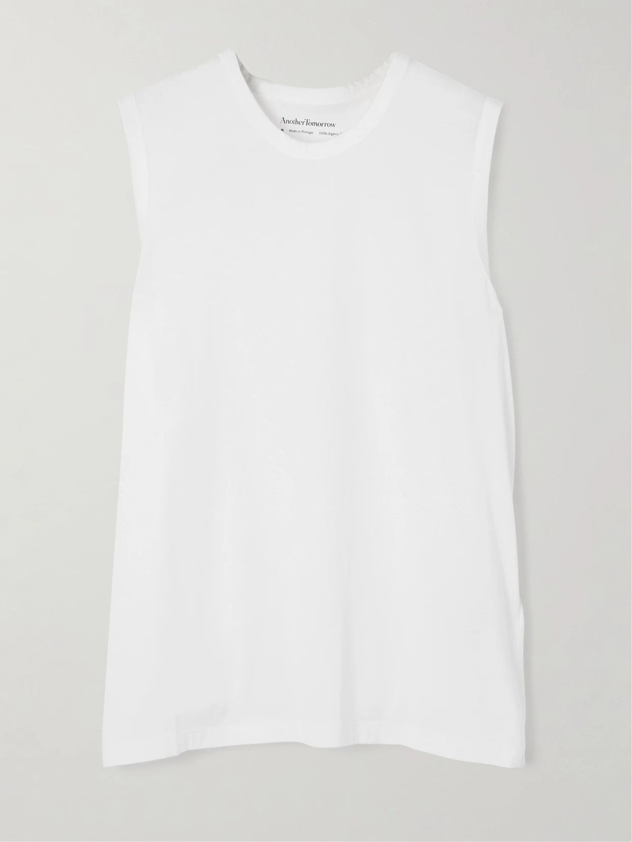 Image of a model wearing Tops. Product name - Organic Cotton-jersey Tank Top in White colour by brand - Another Tomorrow