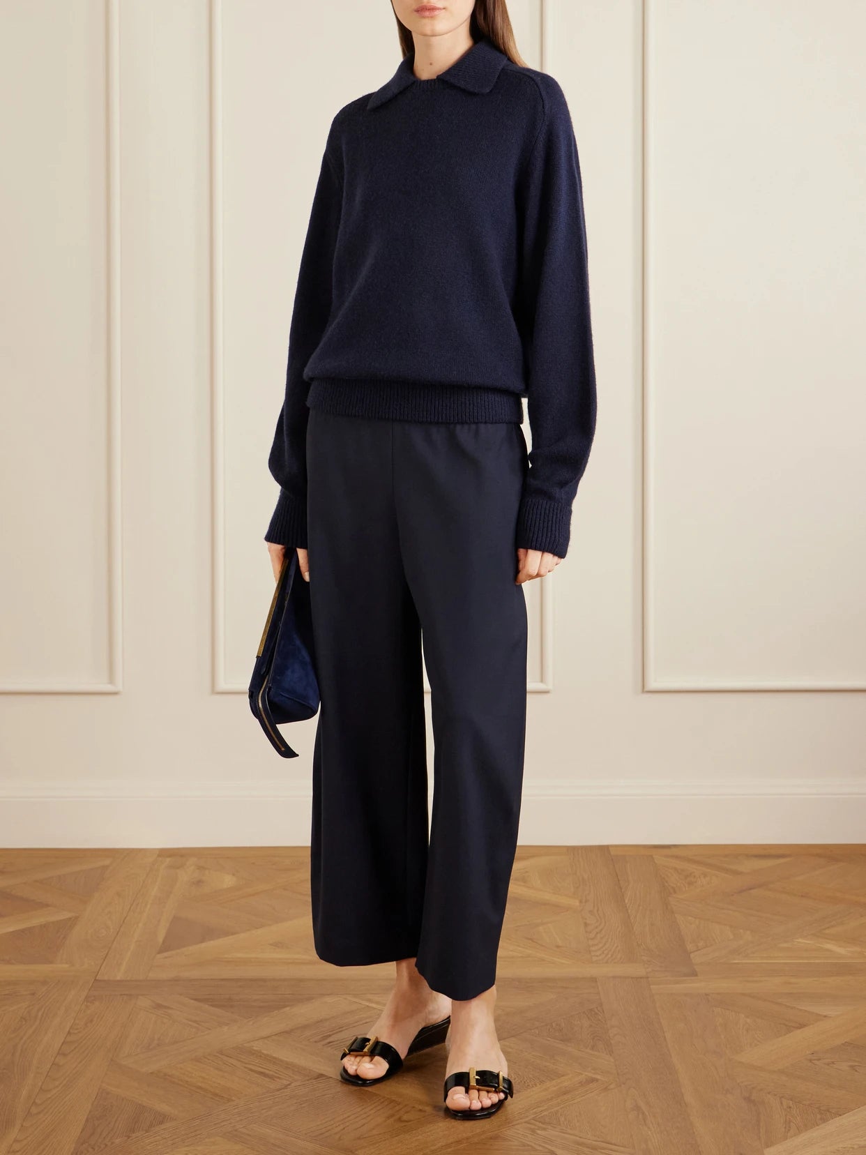 Image of a model wearing Outerwear. Product name - Jackson Wool And Cashmere Sweater in Navy colour by brand - KHAITE