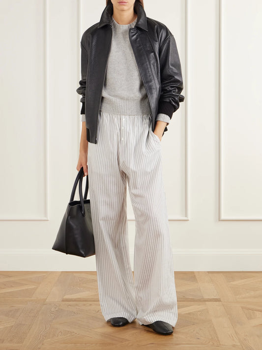 Image of a model wearing Outerwear. Product name - Rib-trimmed Cashmere Sweater in Light gray colour by brand - Allude