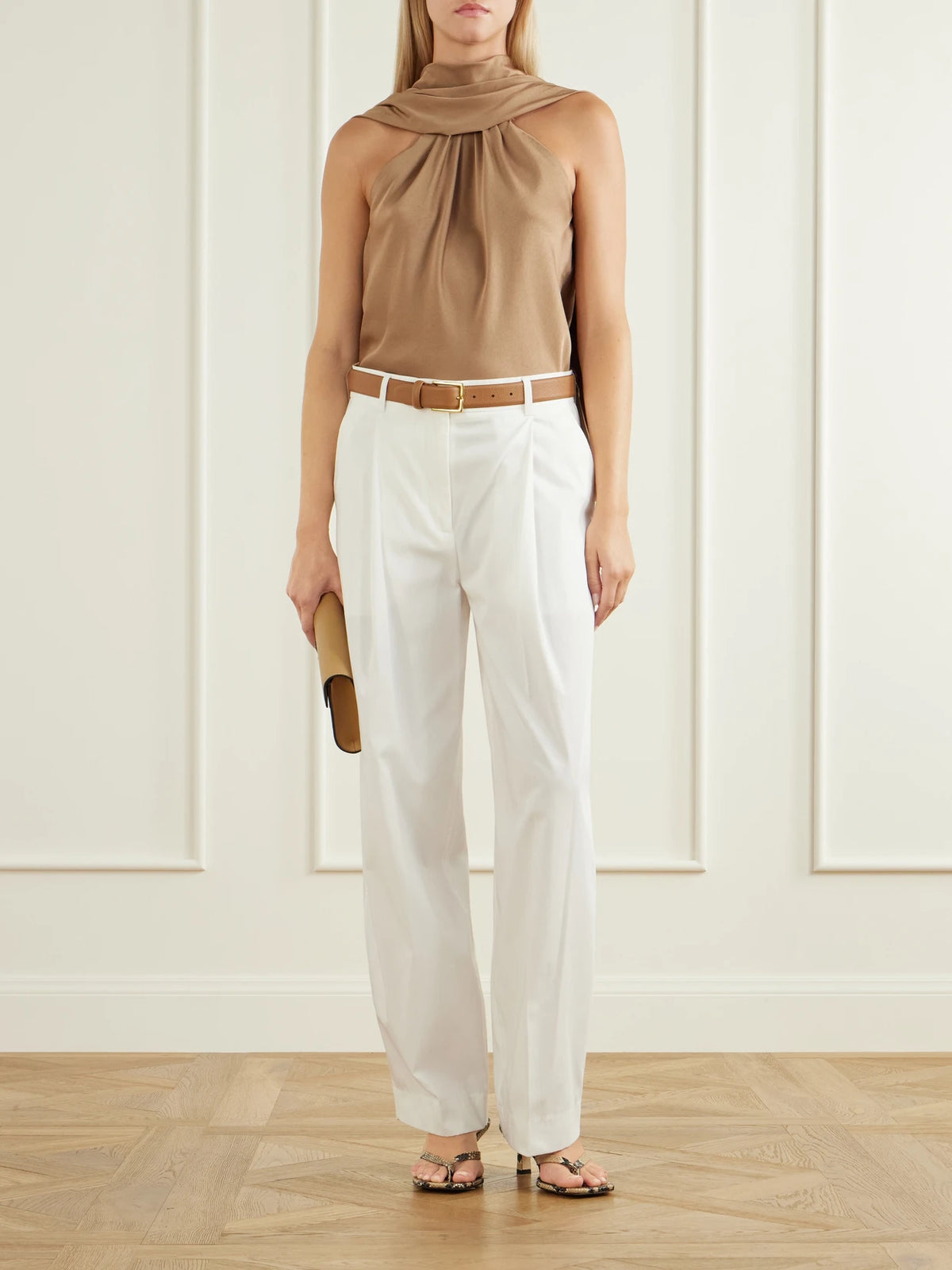 Image of a model wearing Tops. Product name - Scarlett Gathered Satin Cape Top in Brown colour by brand - SIMKHAI