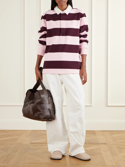 Image of a model wearing Outerwear. Product name - Boyfriend Fleece Striped Cotton-jersey Polo Shirt in Burgundy, Gray colour by brand - SKIMS