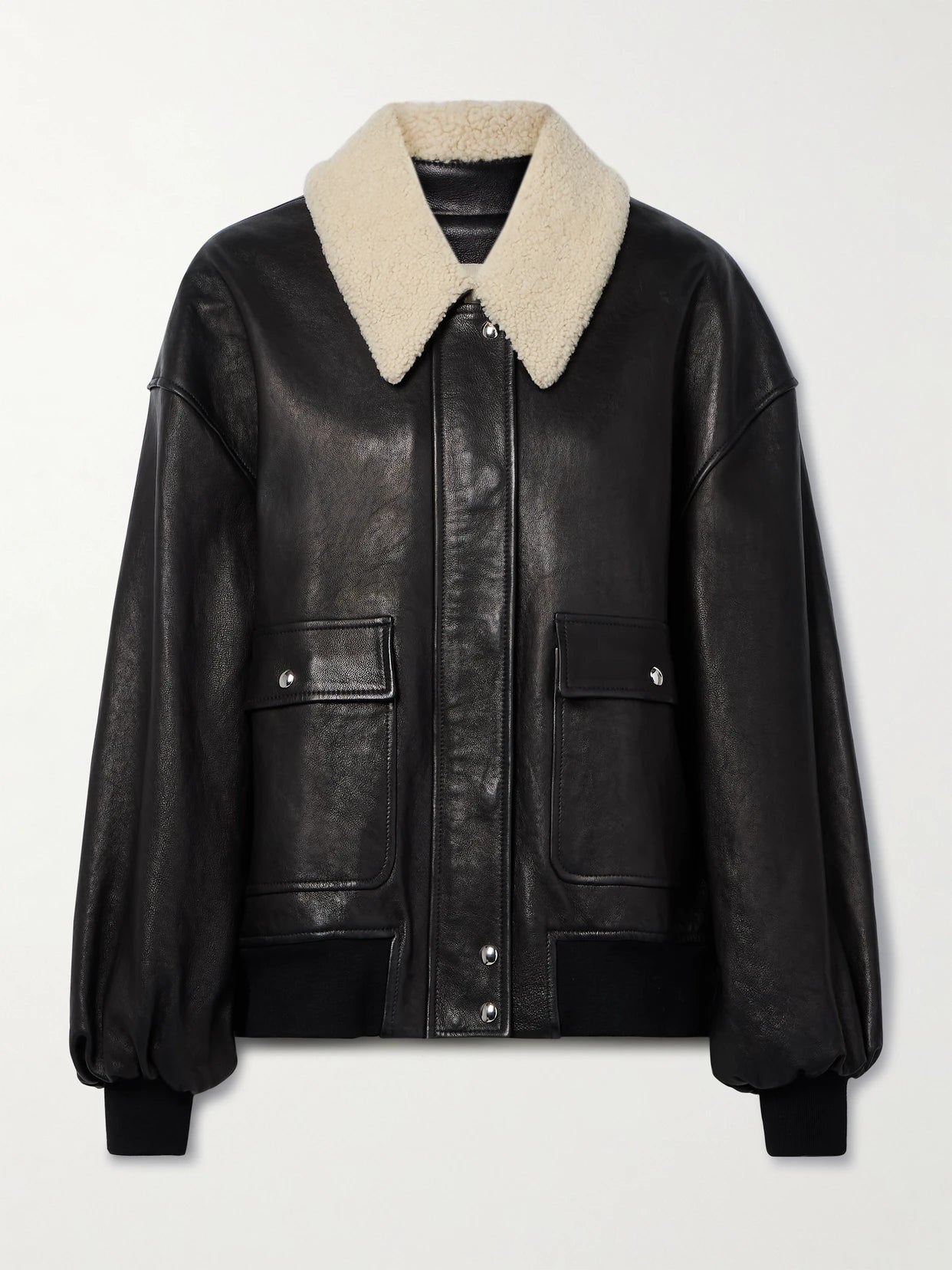 Image of Coats & Jackets. Product name - Shellar Shearling-trimmed Leather Jacket in Black colour by brand - KHAITE