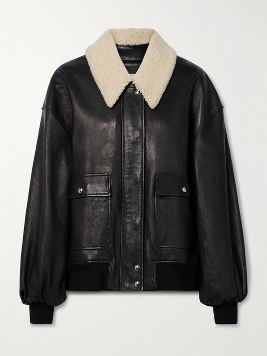 Image of Coats & Jackets. Product name - Shellar Shearling-trimmed Leather Jacket in Black colour by brand - KHAITE