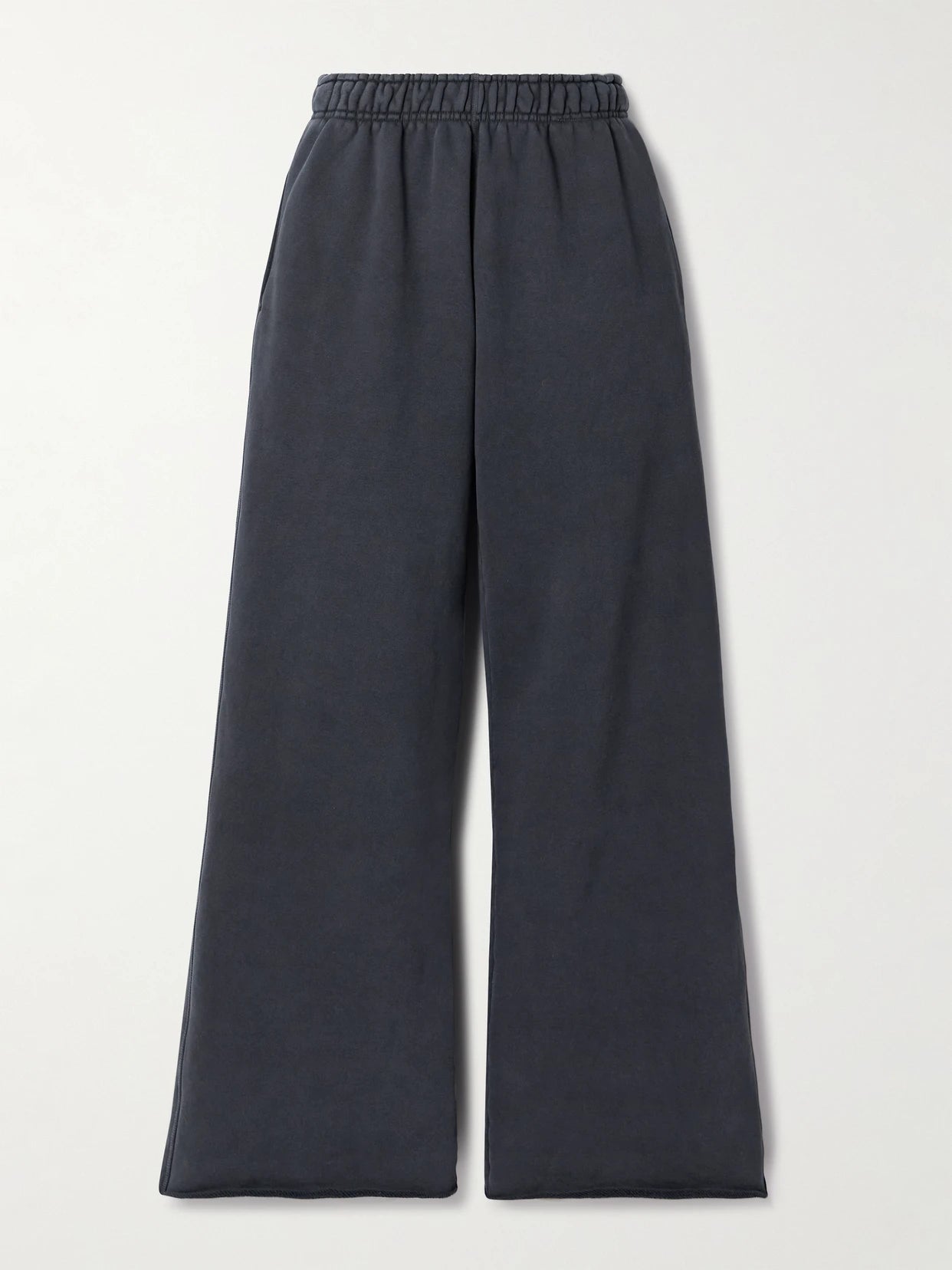 Image of a model wearing Pants. Product name - Cotton-jersey Track Pants in Black colour by brand - SLVRLAKE