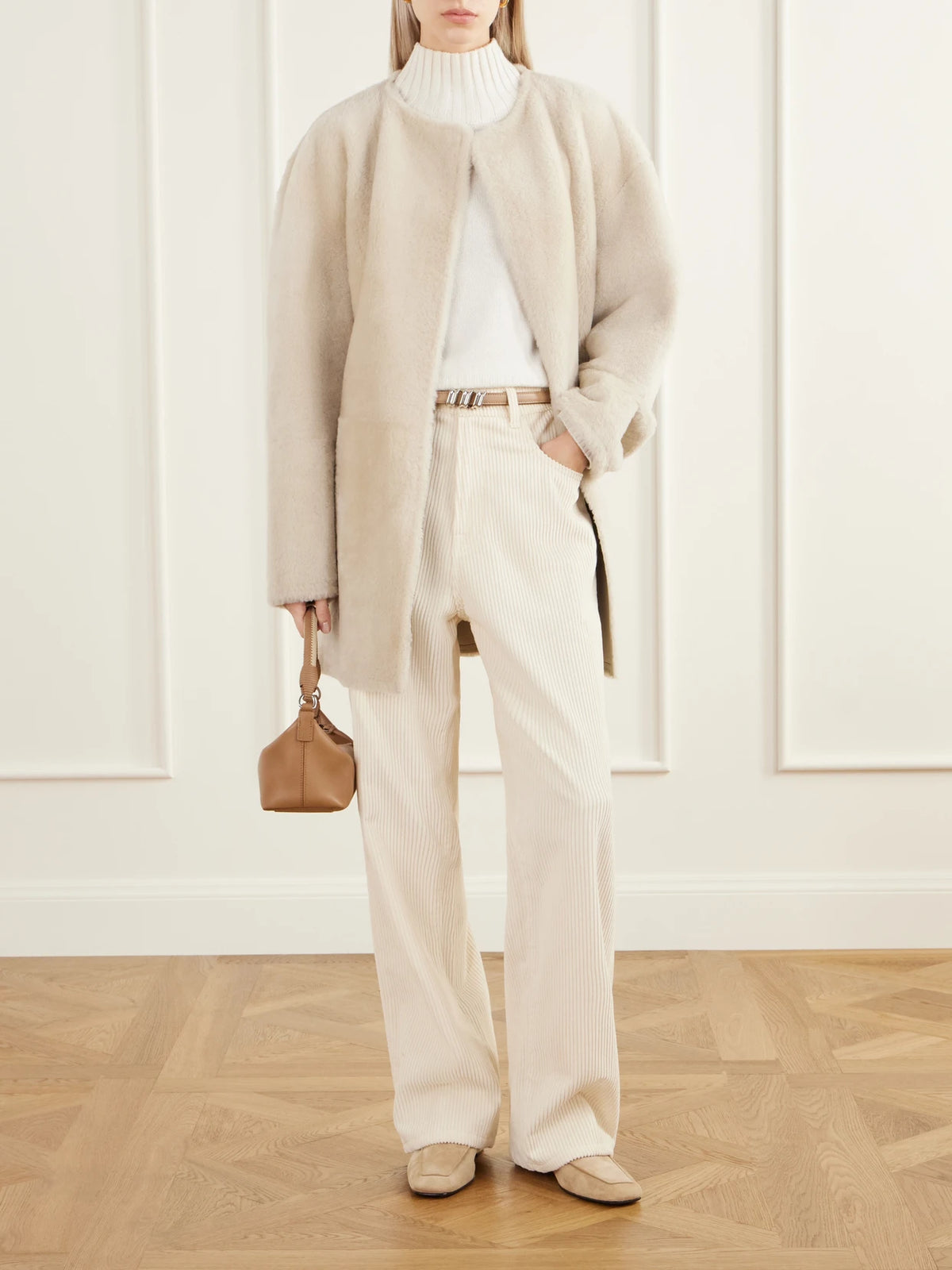 Image of Coats & Jackets. Product name - Sasha Collarless Belted Shearling Coat in Off-white colour by brand - Almada