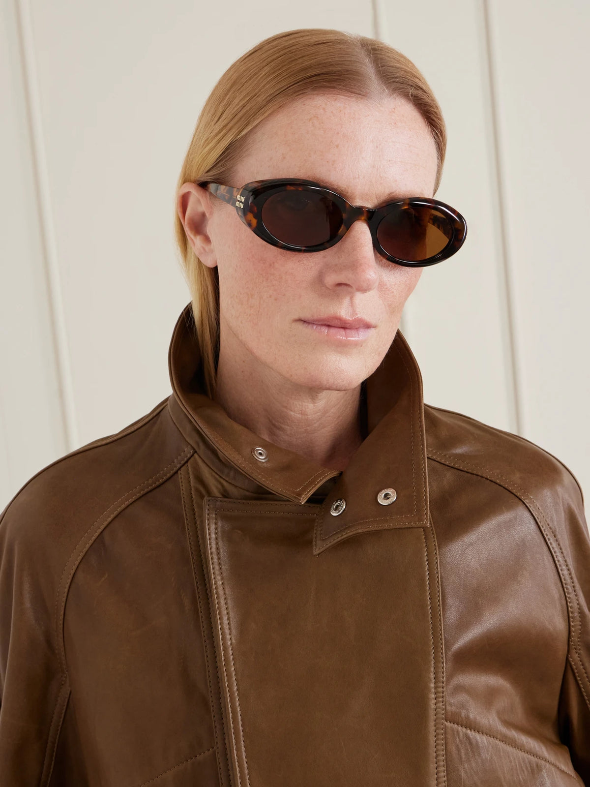 Image of Sunglasses. Product name - Rounded-frame Acetate Sunglasses in Tortoiseshell colour by brand - Miu Miu Eyewear