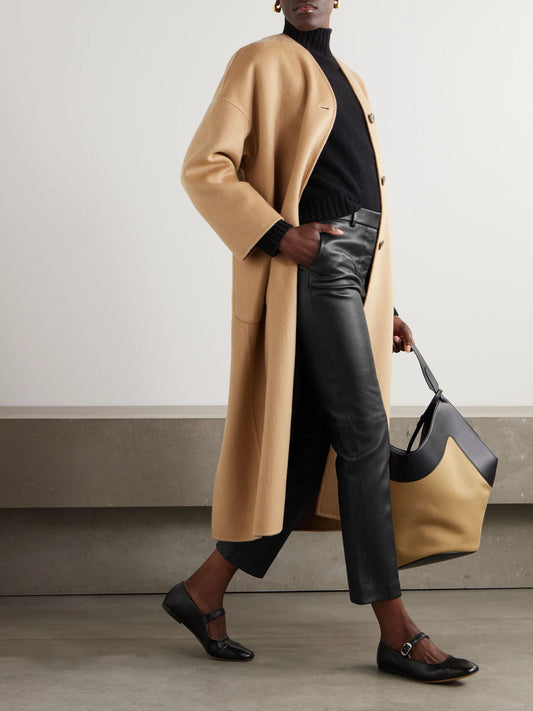 Image of a model wearing Pants. Product name - Coleman Leather Slim-fit Pants in Black colour by brand - Joseph