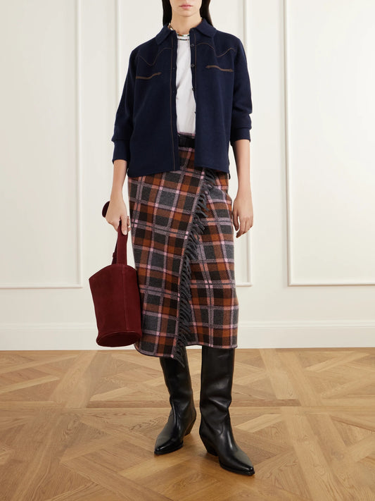 Image of a model wearing Outerwear. Product name - Western Cropped Cashmere Cardigan in Navy colour by brand - Guest In Residence