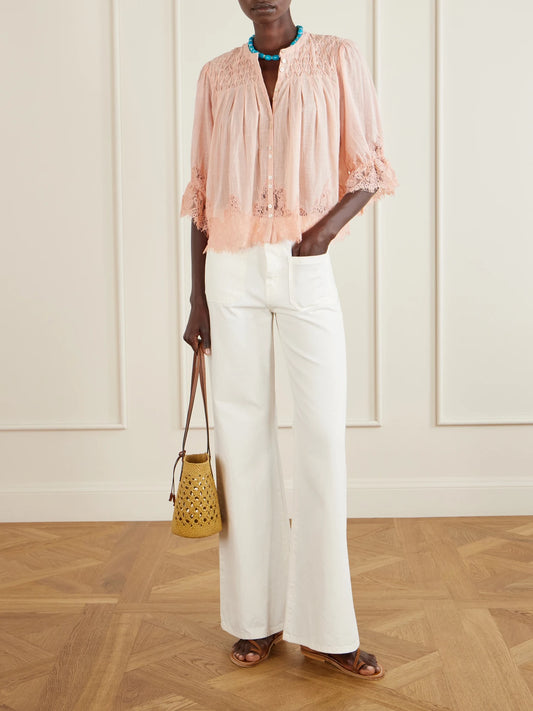 Image of a model wearing Tops. Product name - Erika Shirred Lace-trimmed Cotton-voile Blouse in Peach colour by brand - RIXO