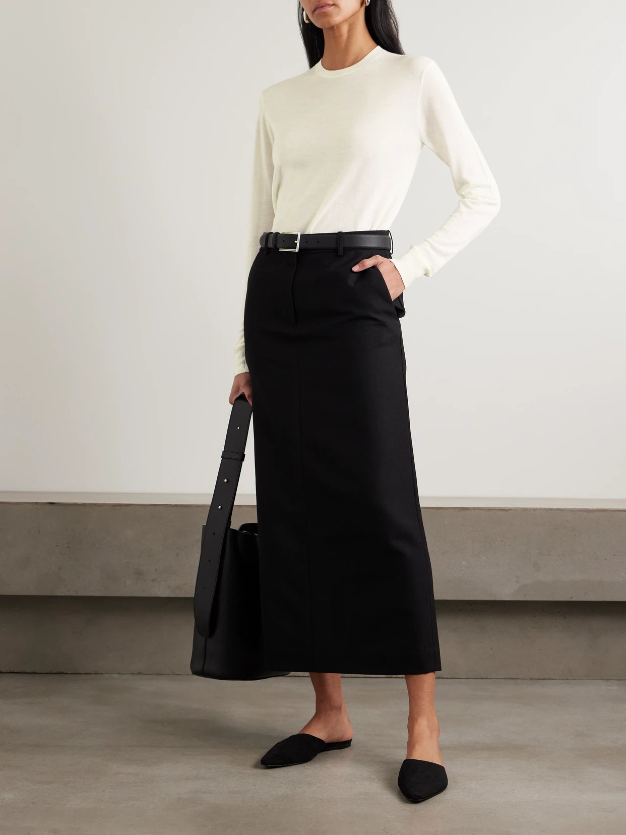 Image of a model wearing Outerwear. Product name - Garderob Wool And Silk-blend Sweater in Ecru colour by brand - TOTEME