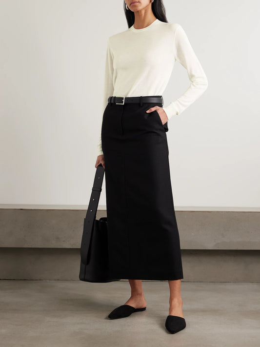 Image of a model wearing Outerwear. Product name - Garderob Wool And Silk-blend Sweater in Ecru colour by brand - TOTEME