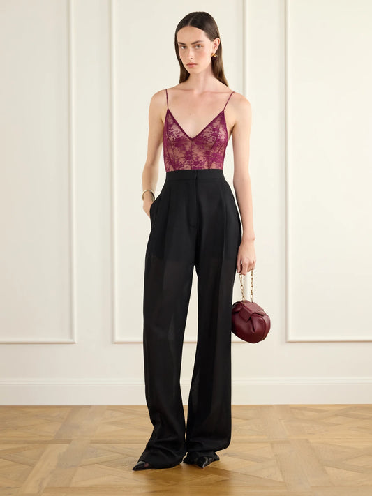 Image of a model wearing Tops. Product name - Lace Bodysuit in Purple colour by brand - Alex Perry