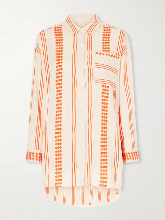 Image of a model wearing Tops. Product name - Mariam Asymmetric Striped Cotton-blend Shirt in Orange colour by brand - lemlem