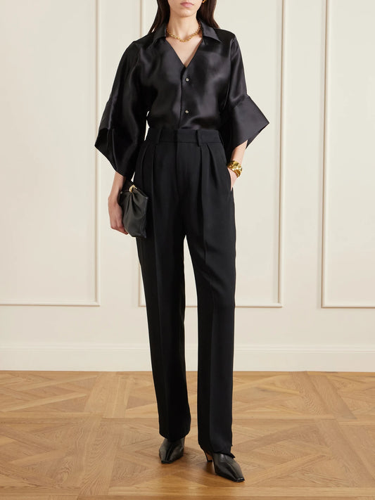 Image of a model wearing Pants. Product name - Aiden Pleated Cady Straight-leg Pants in Black colour by brand - KALLMEYER