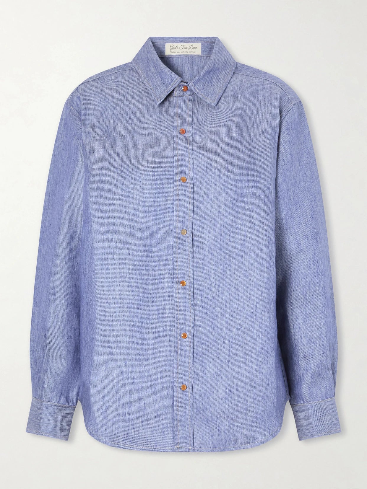 Image of a model wearing Tops. Product name - Linen-denim Shirt in Blue colour by brand - God's True Cashmere