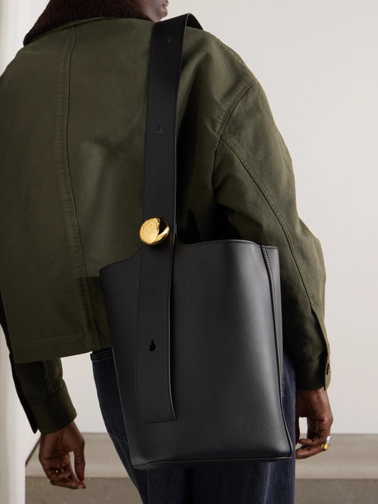 Image of Bags. Product name - Pebble Embellished Leather Bucket Bag in Black colour by brand - LOEWE