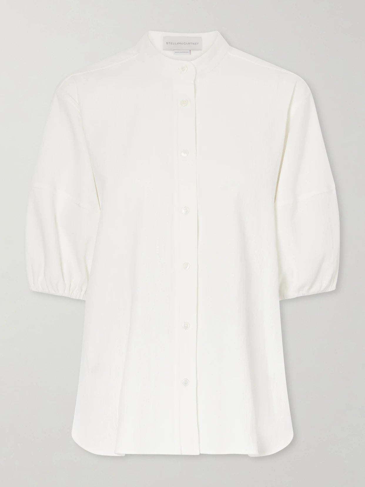 Image of a model wearing Tops. Product name - Cotton-crepon Shirt in White colour by brand - Stella McCartney