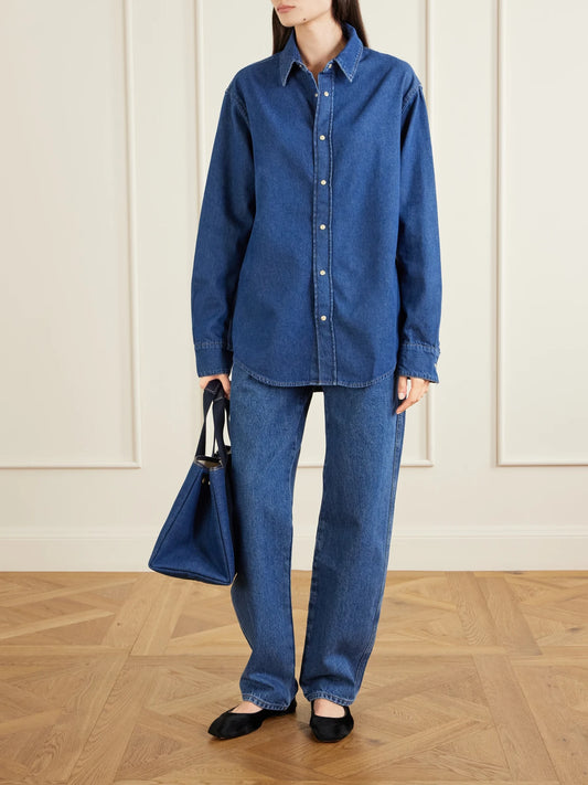 Image of a model wearing Tops. Product name - Denim Shirt in Blue colour by brand - Matteau