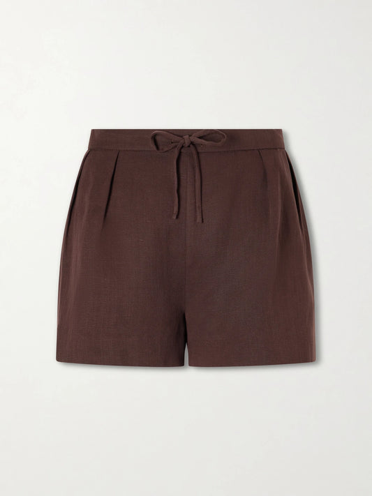 Image of a model wearing Shorts. Product name - Mesa Tencel And Linen-blend Shorts in Brown colour by brand - Faithfull