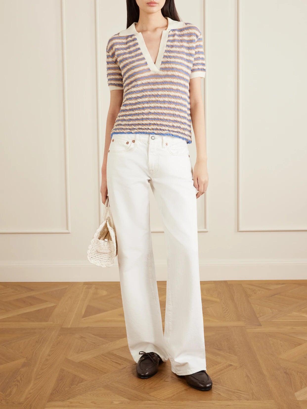 Image of a model wearing Outerwear. Product name - Ophelia Striped Wool Polo Shirt in Beige colour by brand - BERNADETTE
