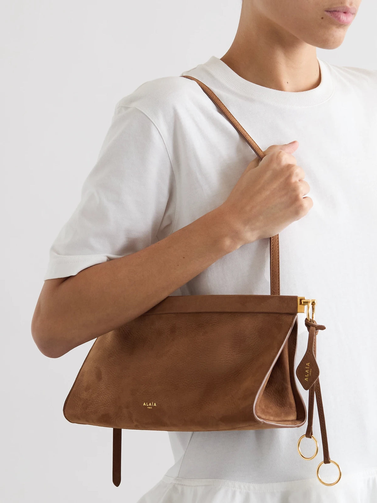 Image of Bags. Product name - Click Medium Nubuck Shoulder Bag in Tan colour by brand - Alaïa