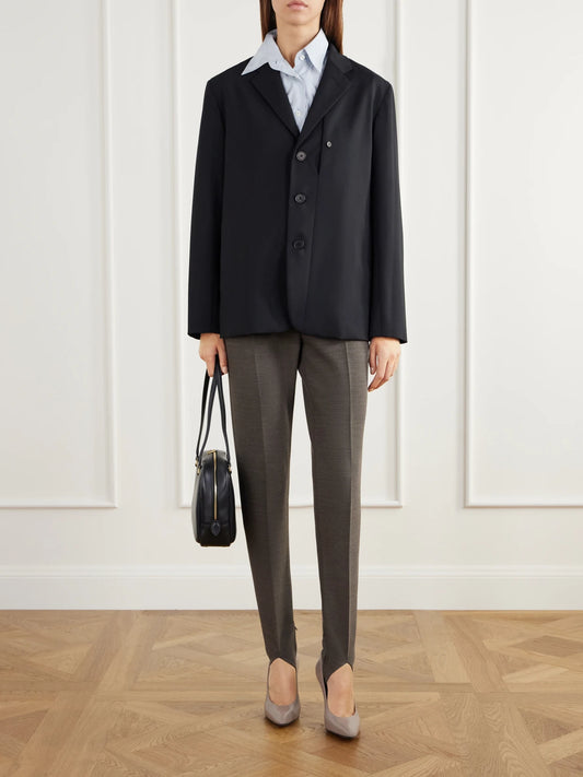 Image of a model wearing Pants. Product name - Wool-blend Stretch-gabardine Straight-leg Stirrup Pants in Gray colour by brand - Jil Sander