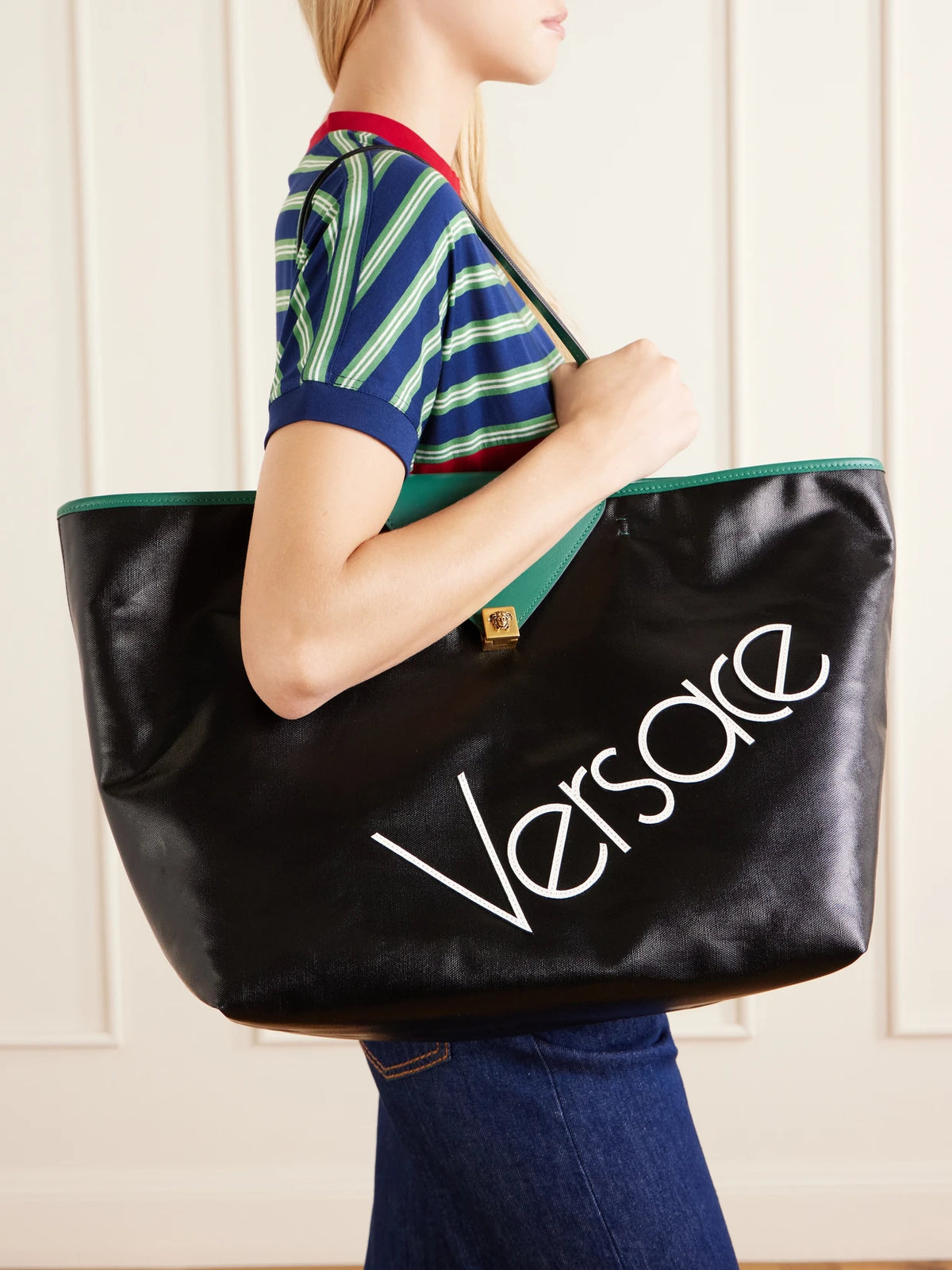 Image of Bags. Product name - Logo-appliquéd Leather-trimmed Coated-canvas Tote in Black colour by brand - Versace