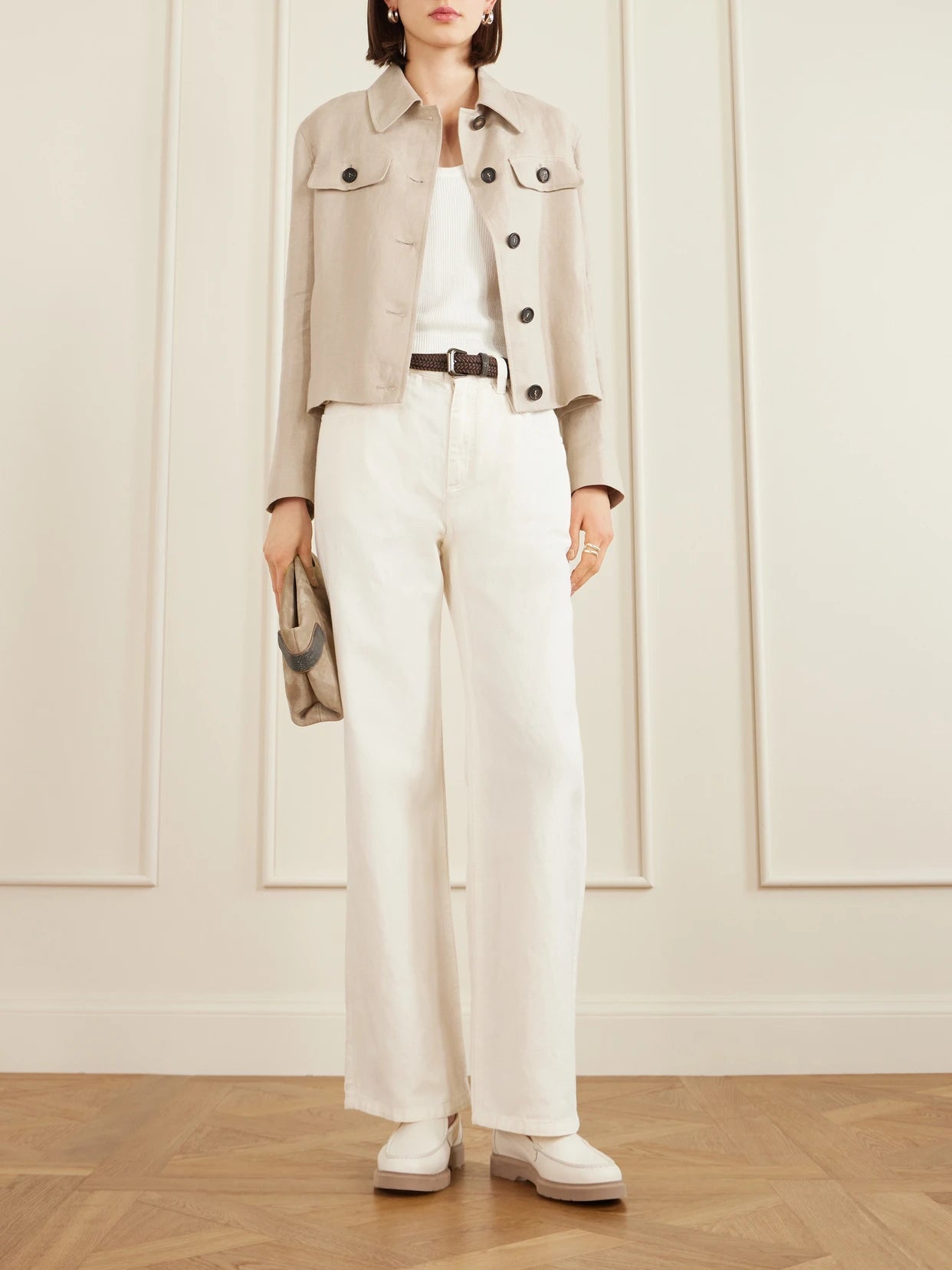 Image of a model wearing Tops. Product name - Ribbed Cotton Tank in White colour by brand - Brunello Cucinelli
