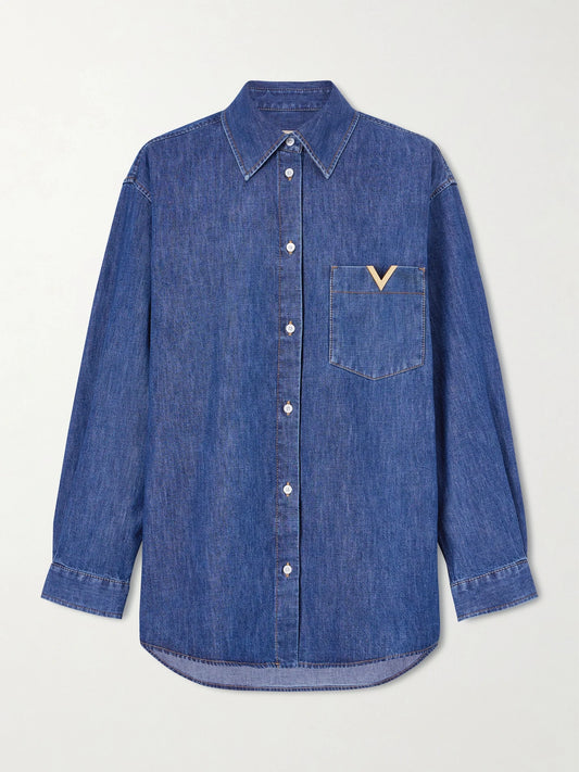 Image of a model wearing Tops. Product name - Embellished Cotton-denim Shirt in Dark denim colour by brand - Valentino Garavani
