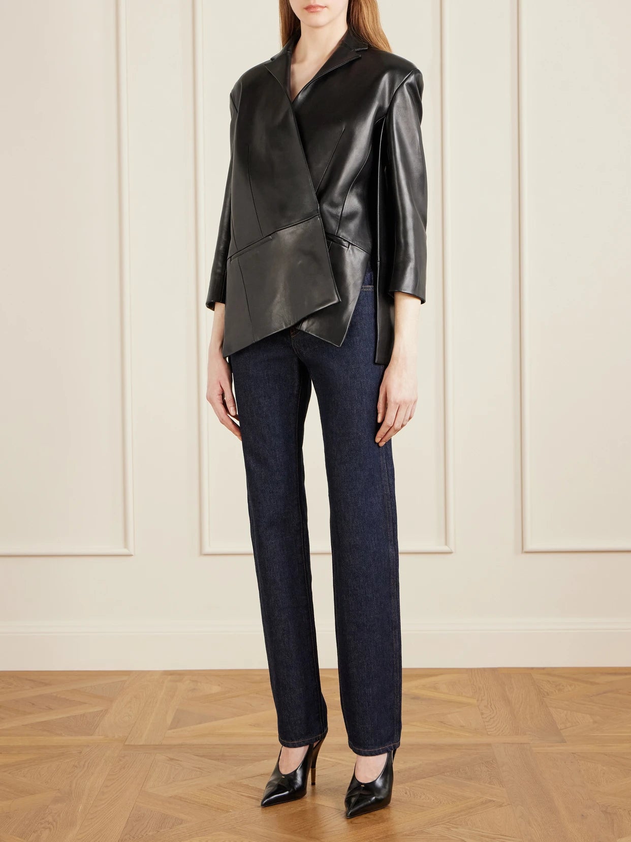 Image of Coats & Jackets. Product name - Asymmetric Paneled Leather Blazer in Black colour by brand - KHAITE