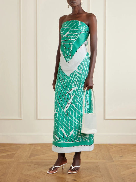 Image of a model wearing Skirts. Product name - Linnie Printed Silk Maxi Skirt in Green colour by brand - Altuzarra