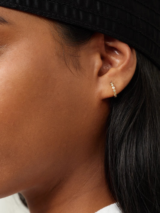 Image of Earrings. Product name - 10-karat Gold Diamond Hoop Earrings in Multi colour by brand - STONE AND STRAND