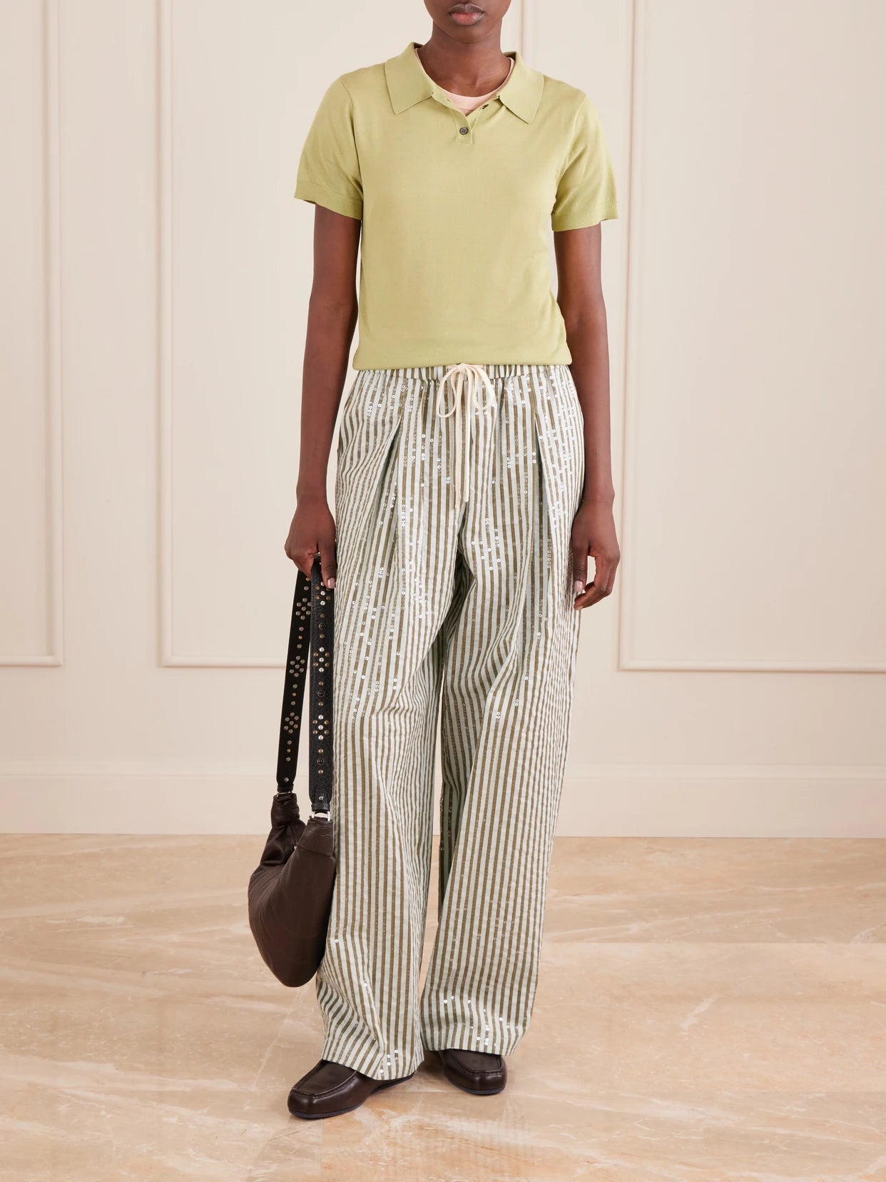 Image of a model wearing Pants. Product name - Pj Sequin-trimmed Striped Cotton-blend Wide-leg Drawstring Pants in Multi colour by brand - TWP