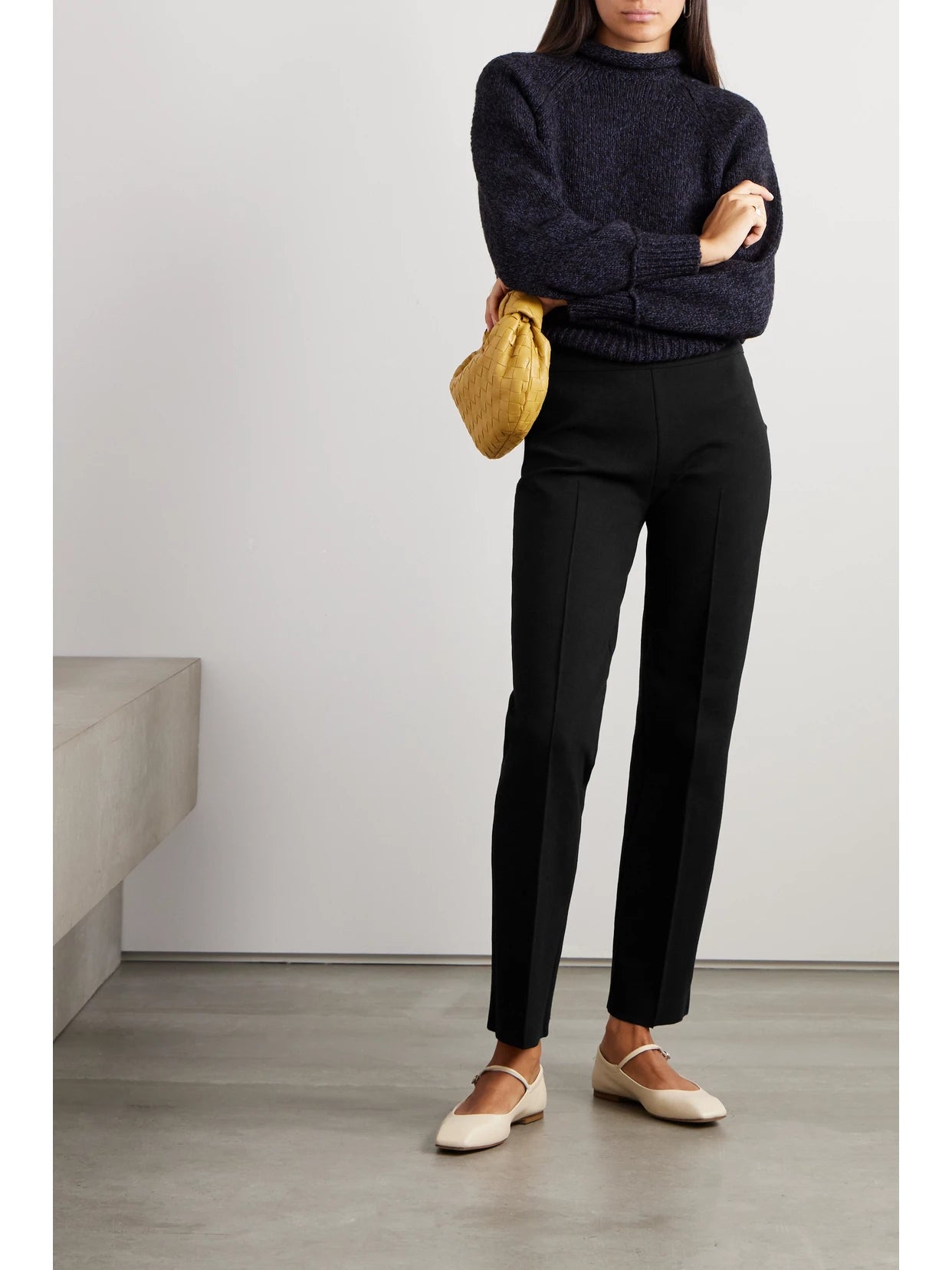 Image of a model wearing Pants. Product name - Jules Stretch-cotton Straight-leg Pants in Black colour by brand - HIGH SPORT