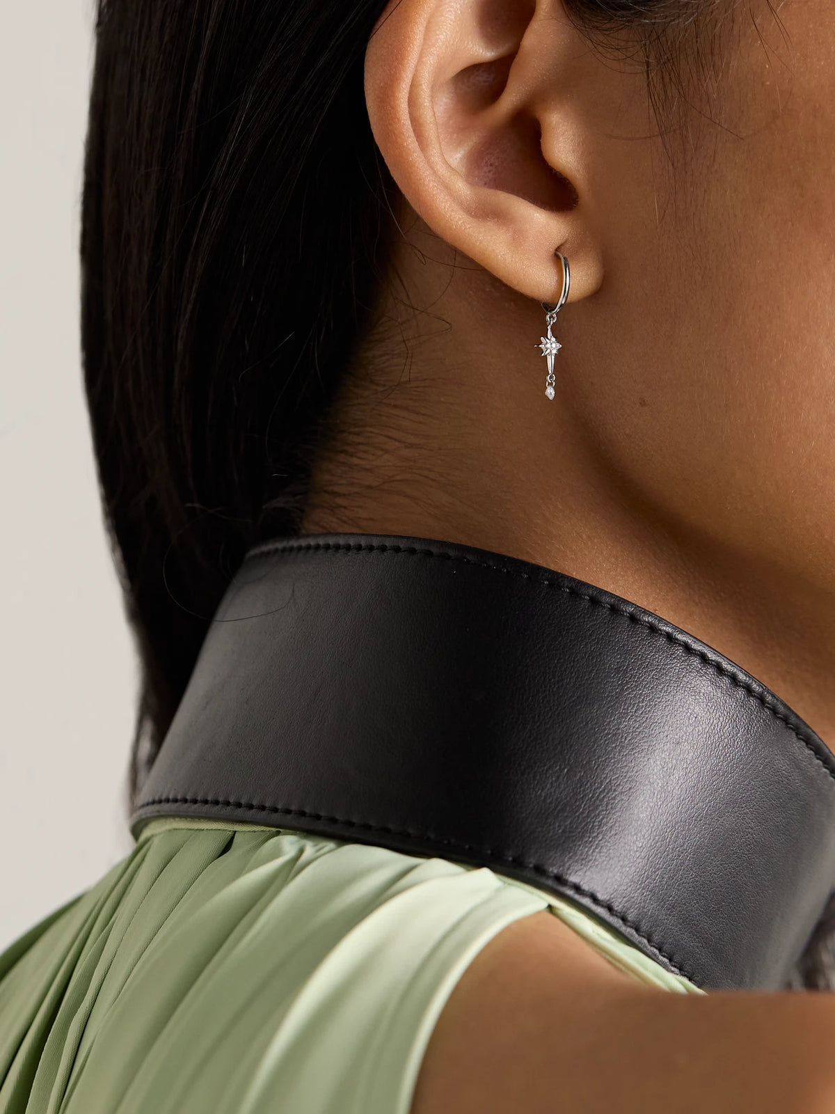 Image of Earrings. Product name - North Star 18-karat White Gold Diamond Single Hoop Earring in Multi colour by brand - Persée