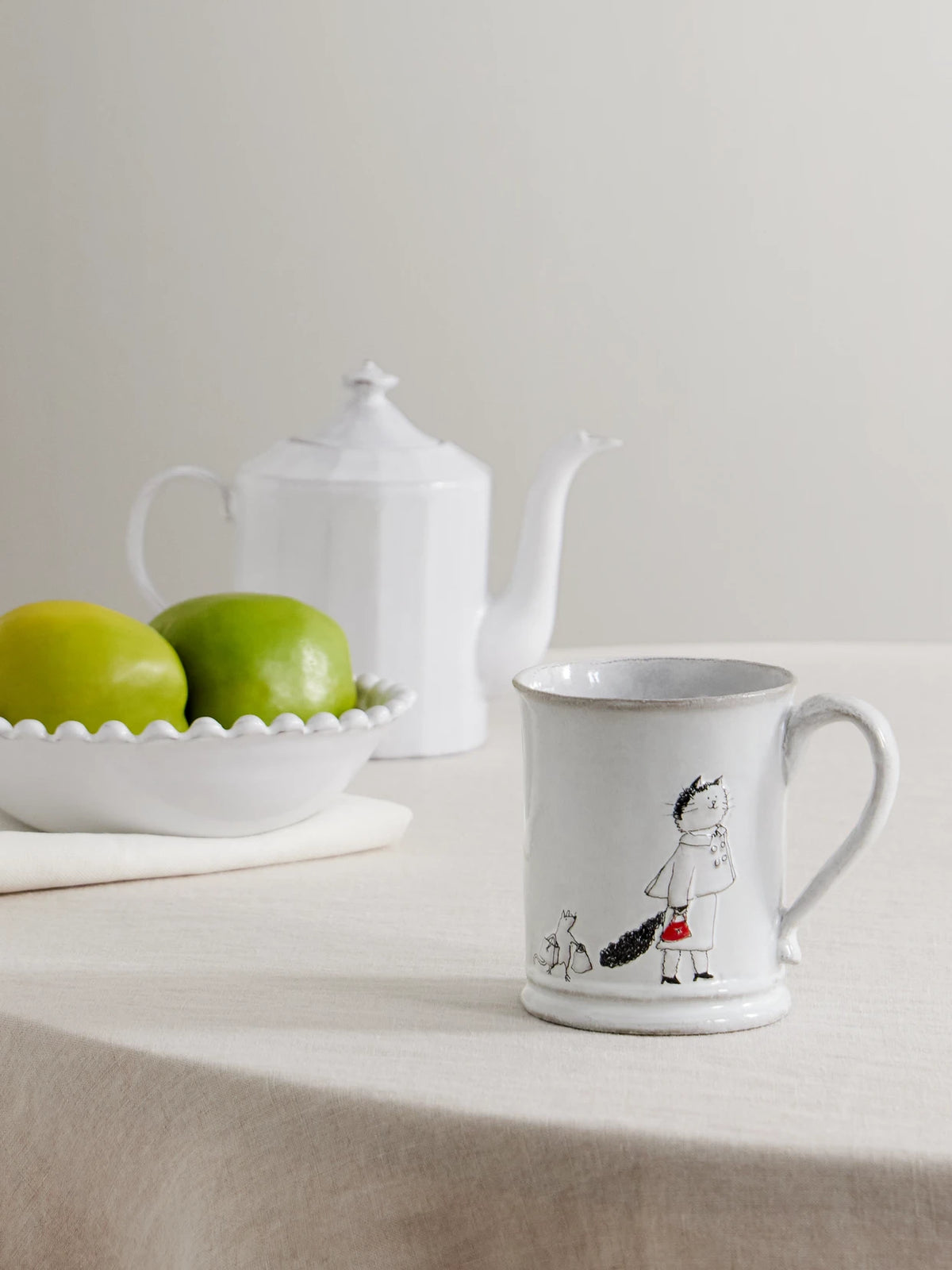 Image of Tableware. Product name - + Grace Coddington Keeping Up Painted Ceramic Mug in White colour by brand - Astier De Villatte